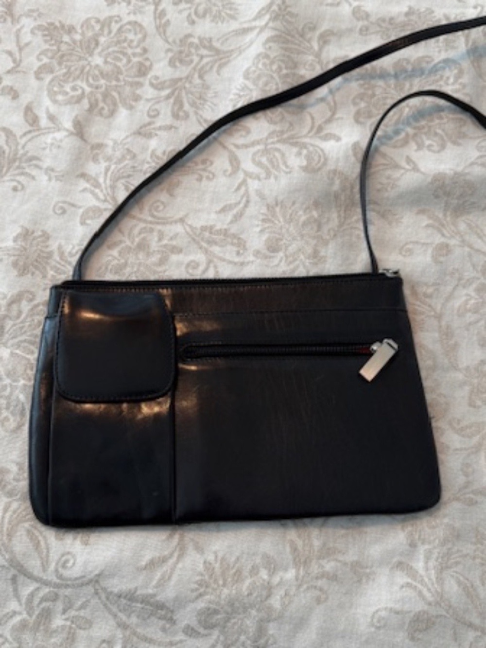 HOBO black leather cross body bag.